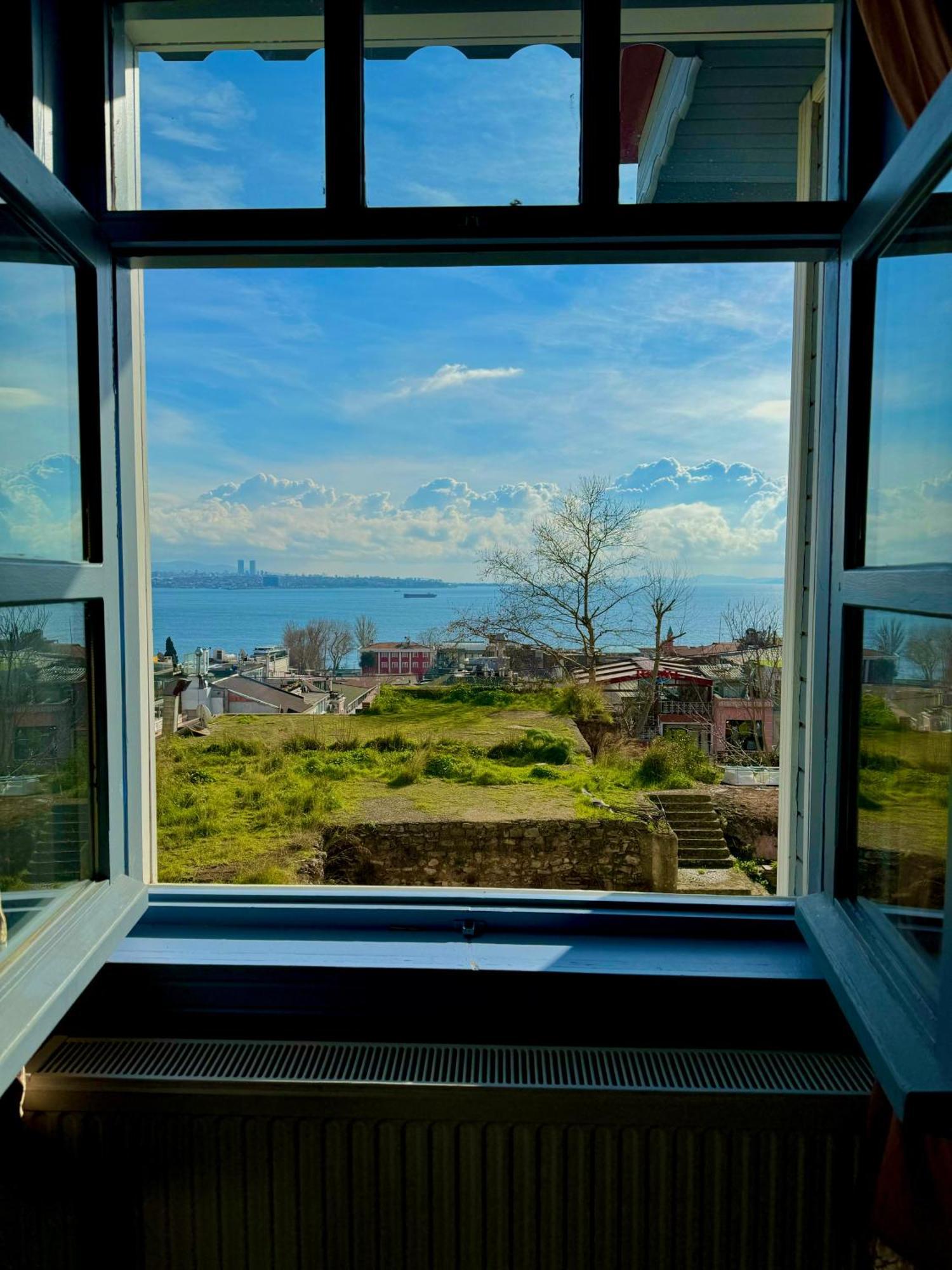 Cheers Vintage Hostel Istanbul Exterior photo View of the Aegean Sea from the window of a house in Çeşme